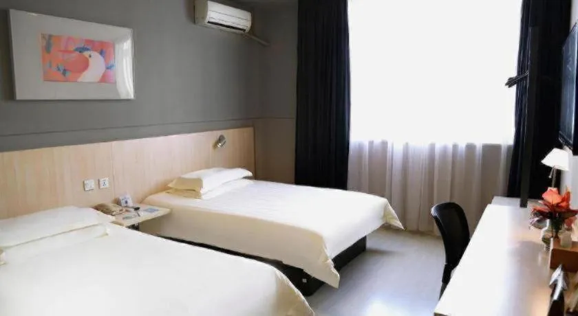 Bed in Jinjiang Inn Taizhou Huangyan Jiufeng Park