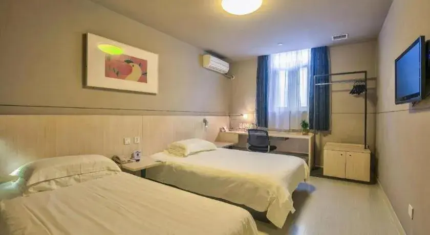 Bed in Jinjiang Inn Taizhou Huangyan Jiufeng Park Bed in Jinjiang Inn Taizhou Huangyan Jiufeng Park