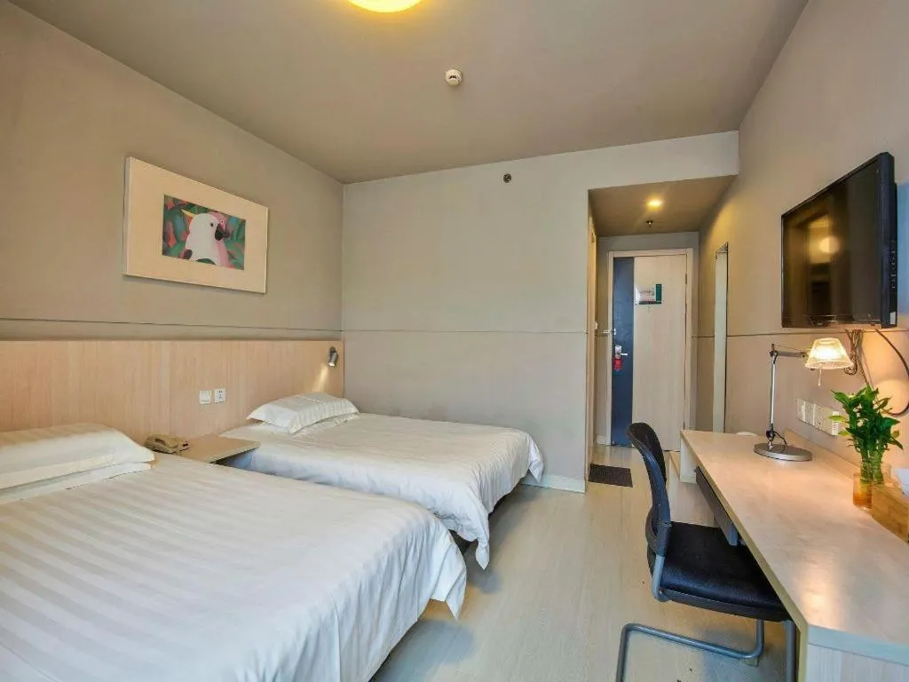 Bed in Jinjiang Inn Taizhou Huangyan Jiufeng Park