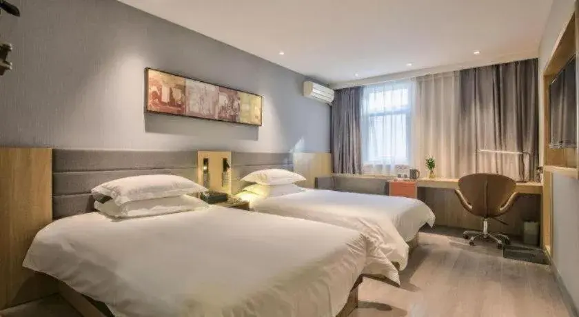 Bed in Jinjiang Inn Taizhou Huangyan Jiufeng Park Bed in Jinjiang Inn Taizhou Huangyan Jiufeng Park