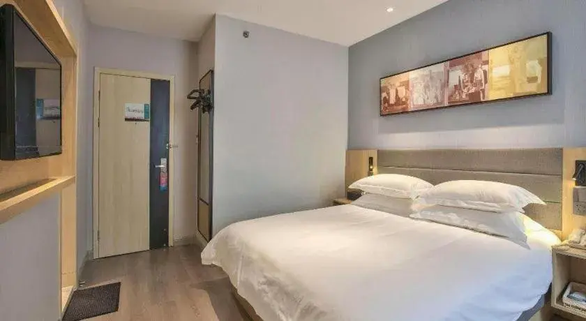 Bed in Jinjiang Inn Taizhou Huangyan Jiufeng Park Bed in Jinjiang Inn Taizhou Huangyan Jiufeng Park