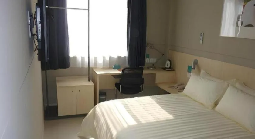 Bed in Jinjiang Inn Taizhou Huangyan Jiufeng Park