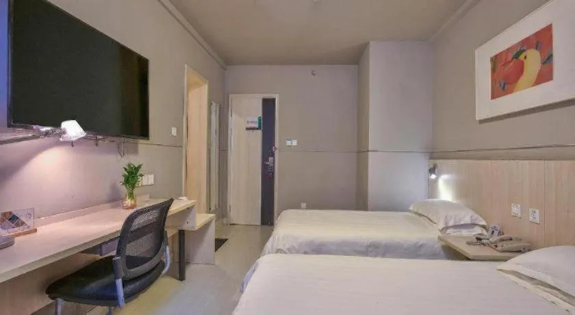 Bed in Jinjiang Inn Taizhou Huangyan Jiufeng Park