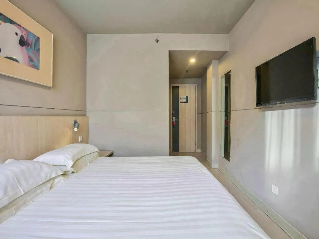 Bed in Jinjiang Inn Taizhou Huangyan Jiufeng Park