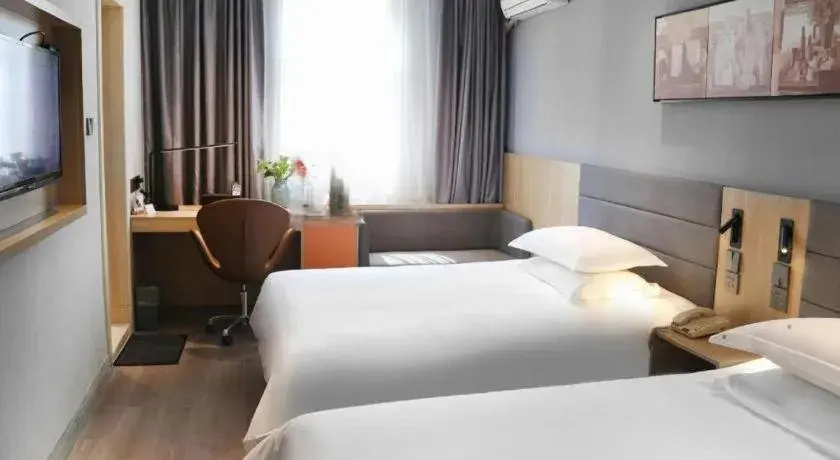 Bed in Jinjiang Inn Taizhou Huangyan Jiufeng Park Bed in Jinjiang Inn Taizhou Huangyan Jiufeng Park