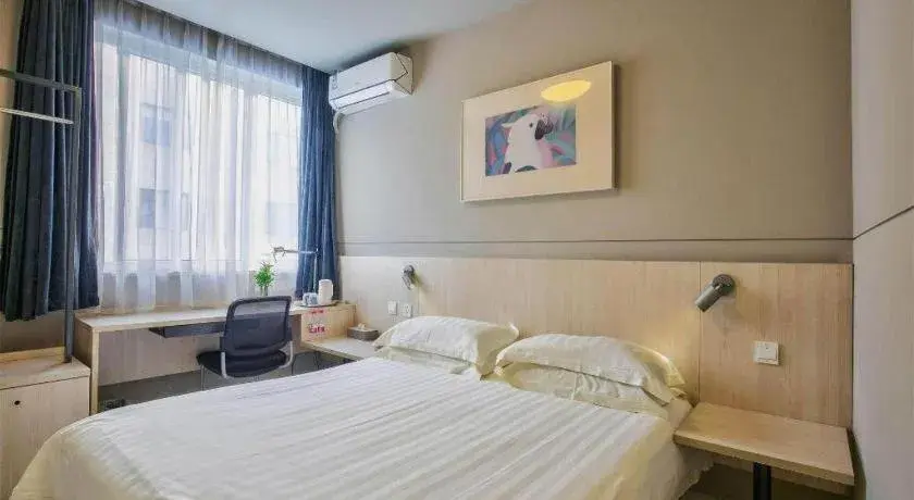 Bed in Jinjiang Inn Taizhou Huangyan Jiufeng Park Bed in Jinjiang Inn Taizhou Huangyan Jiufeng Park