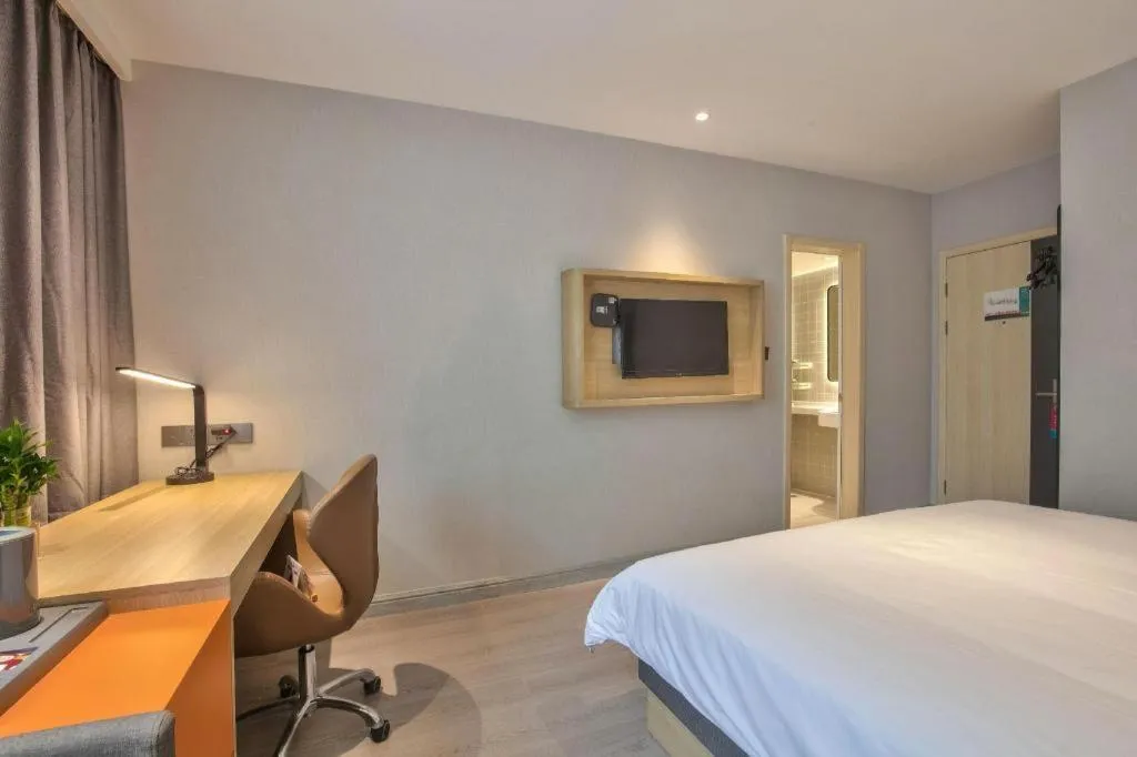 Bed in Jinjiang Inn Taizhou Huangyan Jiufeng Park