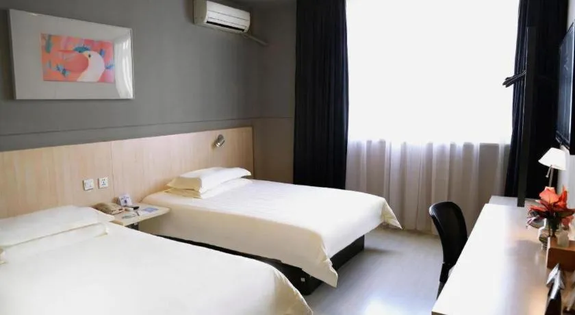 Bed in Jinjiang Inn Taizhou Huangyan Jiufeng Park