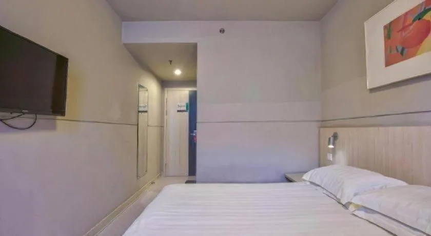 Bed in Jinjiang Inn Taizhou Huangyan Jiufeng Park