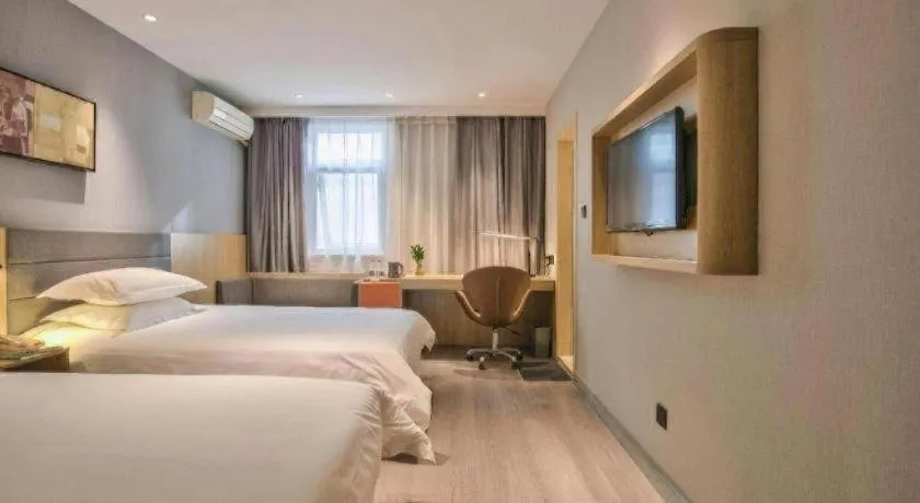 Bed in Jinjiang Inn Taizhou Huangyan Jiufeng Park