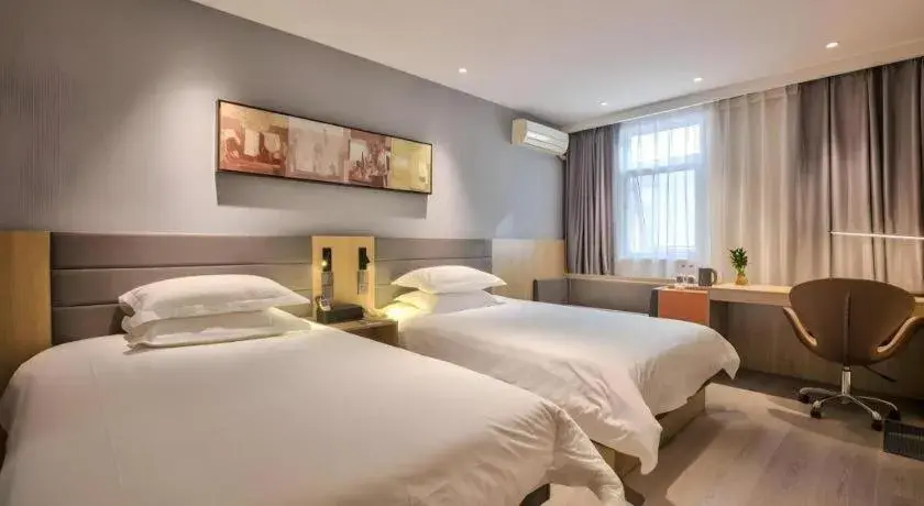 Bed in Jinjiang Inn Taizhou Huangyan Jiufeng Park Bed in Jinjiang Inn Taizhou Huangyan Jiufeng Park