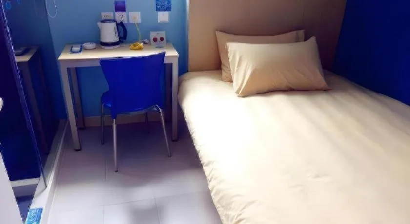 Bed in Jinjiang Inn Taizhou Huangyan Jiufeng Park