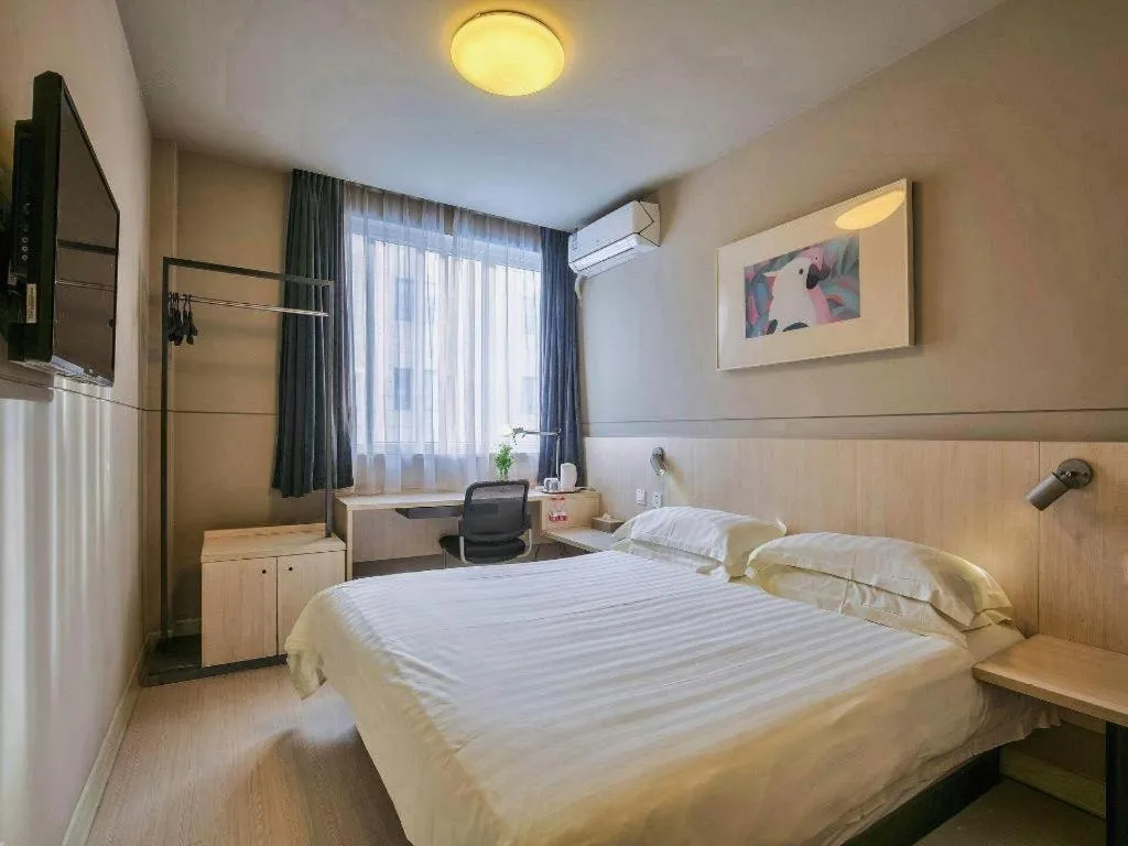 Bed in Jinjiang Inn Taizhou Huangyan Jiufeng Park