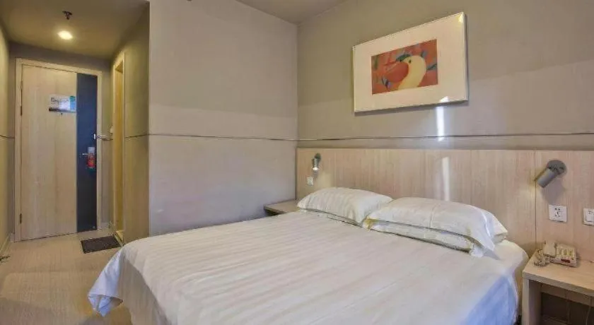 Bed in Jinjiang Inn Taizhou Huangyan Jiufeng Park