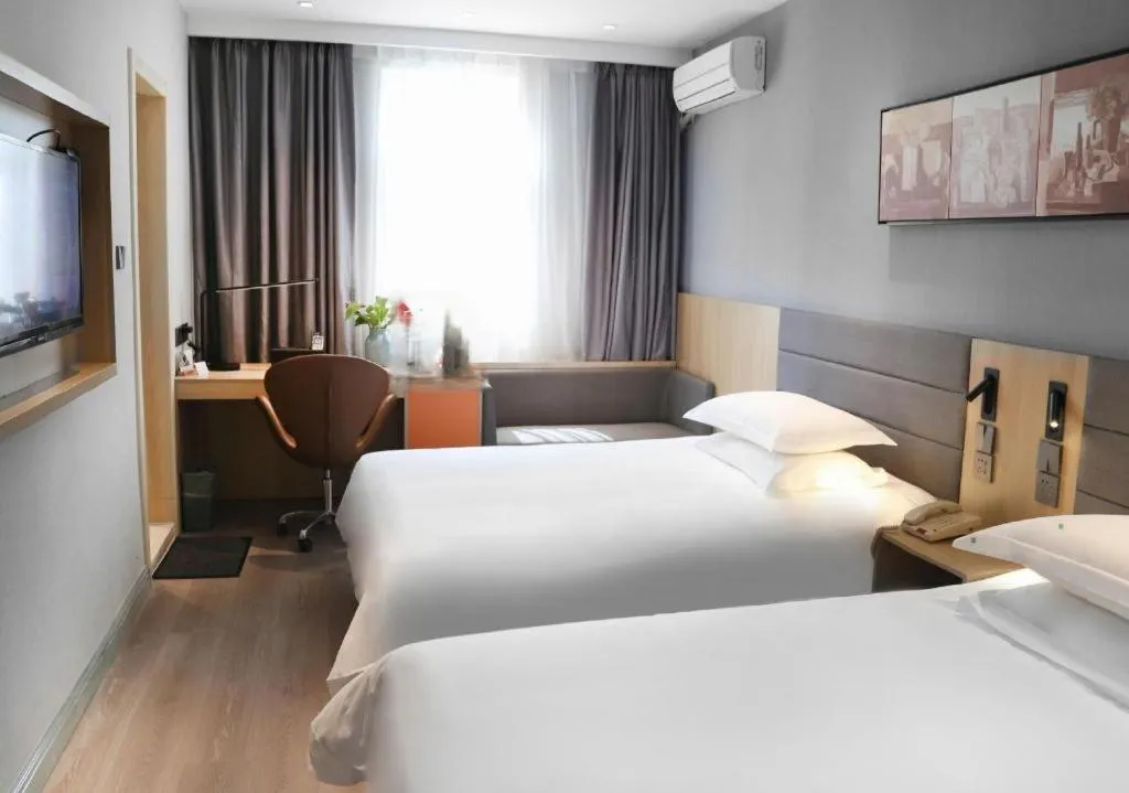 Bed in Jinjiang Inn Taizhou Huangyan Jiufeng Park