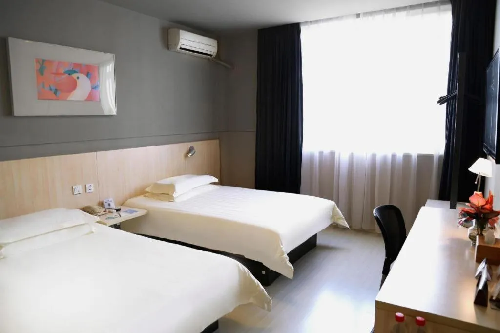 Bed in Jinjiang Inn Taizhou Huangyan Jiufeng Park