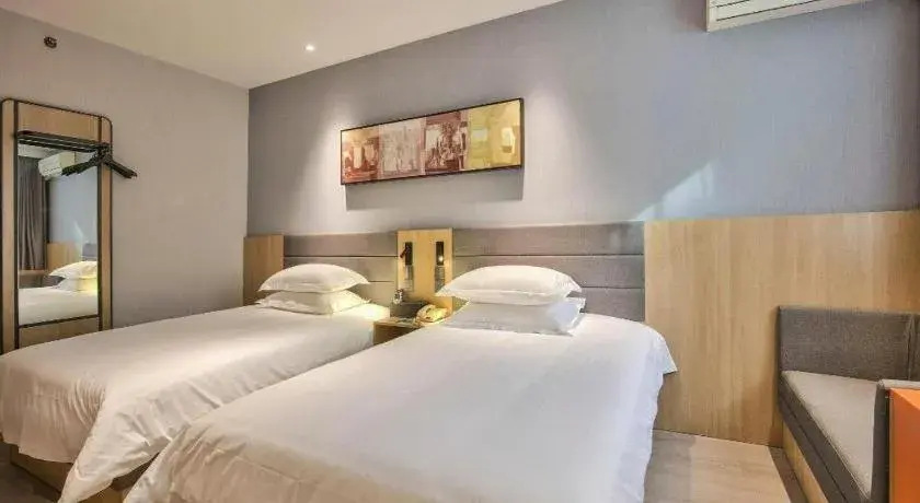 Bed in Jinjiang Inn Taizhou Huangyan Jiufeng Park Bed in Jinjiang Inn Taizhou Huangyan Jiufeng Park