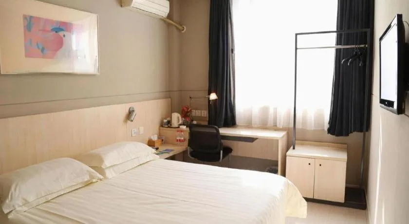 Bed in Jinjiang Inn Taizhou Huangyan Jiufeng Park