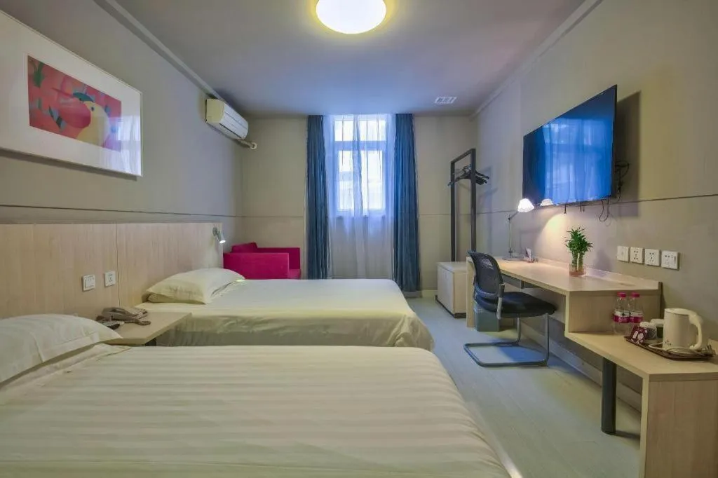 Bed in Jinjiang Inn Taizhou Huangyan Jiufeng Park