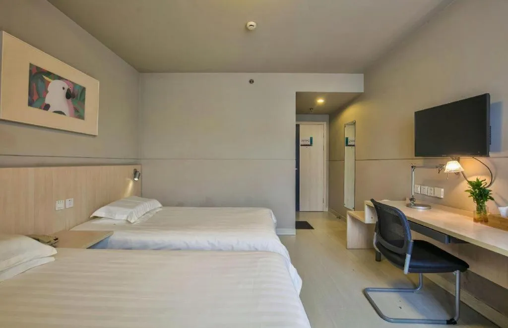 Bed in Jinjiang Inn Taizhou Huangyan Jiufeng Park