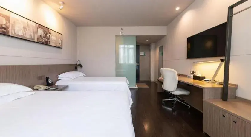 Bed in Jinjiang Inn Xi'an Zhonglou North Street Metro Station Bed in Jinjiang Inn Xi'an Zhonglou North Street Metro Station