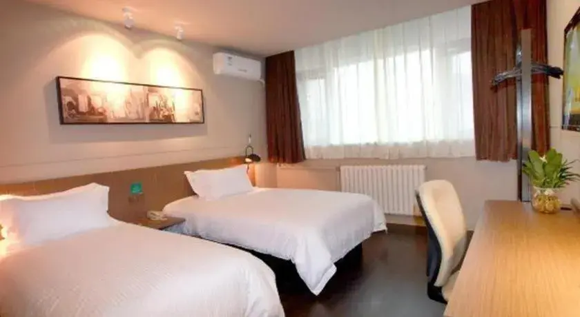 Bed in Jinjiang Inn Xi'an Zhonglou North Street Metro Station Bed in Jinjiang Inn Xi'an Zhonglou North Street Metro Station