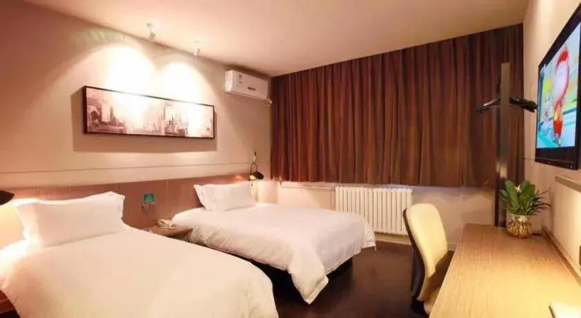 Bed in Jinjiang Inn Xi'an Zhonglou North Street Metro Station Bed in Jinjiang Inn Xi'an Zhonglou North Street Metro Station