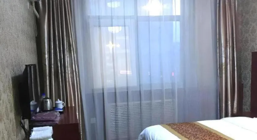 Bed in Shell Hotel Taiyuan South Railway Station New Southeast Bus Station