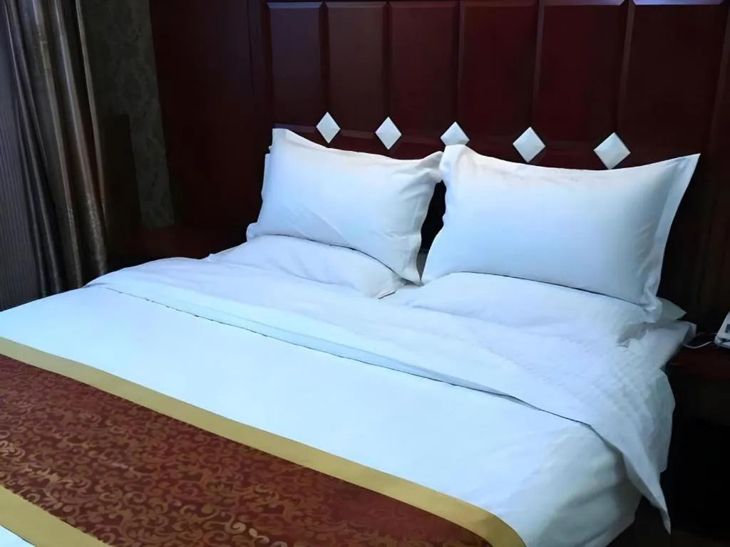 Bed in Shell Hotel Taiyuan South Railway Station New Southeast Bus Station