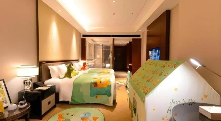 Bed in ANTHEA HOTEL