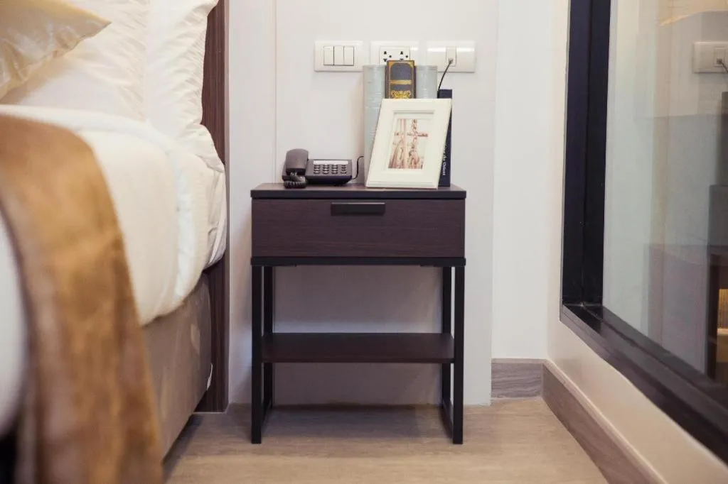 Bed in Thaisun Bangkok Hotel