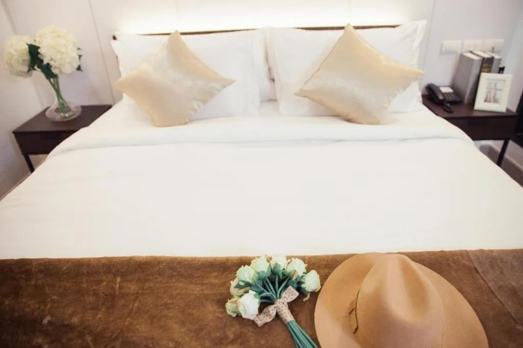 Bed in Thaisun Bangkok Hotel