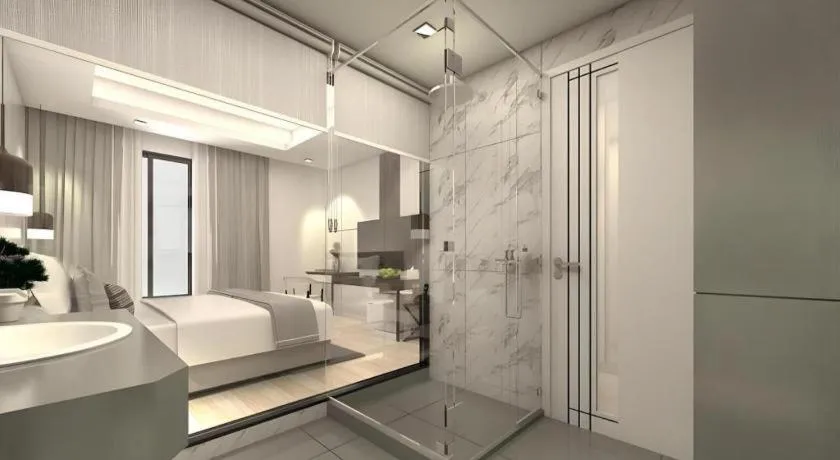 Bed in Thaisun Bangkok Hotel