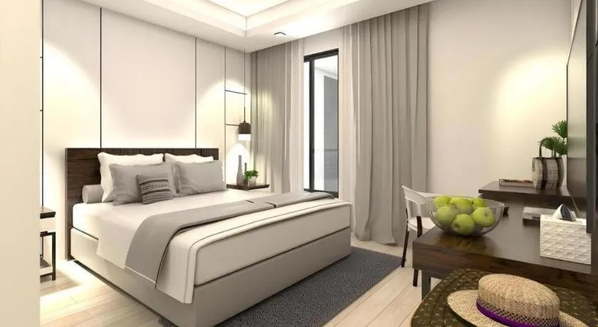 Bed in Thaisun Bangkok Hotel