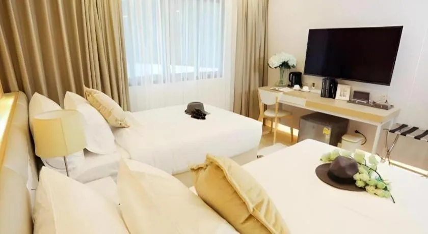 Bed in Thaisun Bangkok Hotel