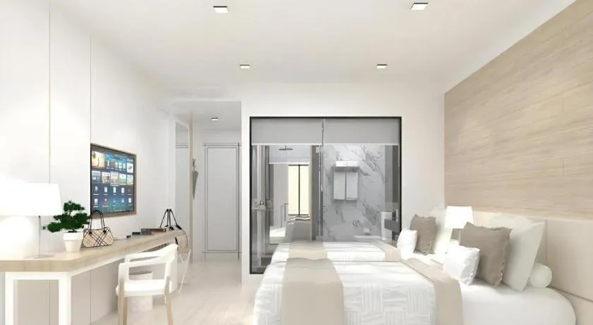 Bed in Thaisun Bangkok Hotel