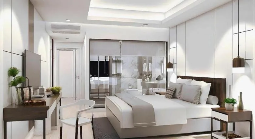 Bed in Thaisun Bangkok Hotel