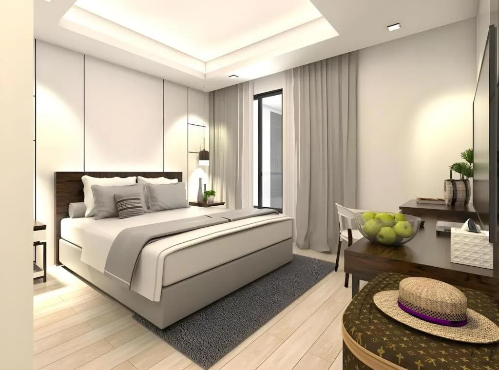 Bed in Thaisun Bangkok Hotel