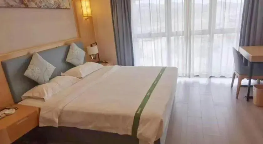 Bed in GreenTree Inn Guiyang Wudang District High-speed Railway East Station Bed in GreenTree Inn Guiyang Wudang District High-speed Railway East Station