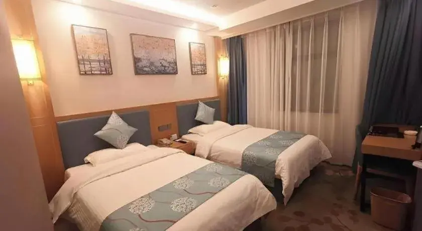Bed in GreenTree Inn Guiyang Wudang District High-speed Railway East Station Bed in GreenTree Inn Guiyang Wudang District High-speed Railway East Station