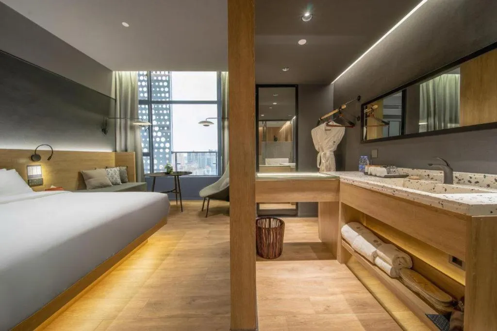 Bed in Opus Hotel Jiangmen