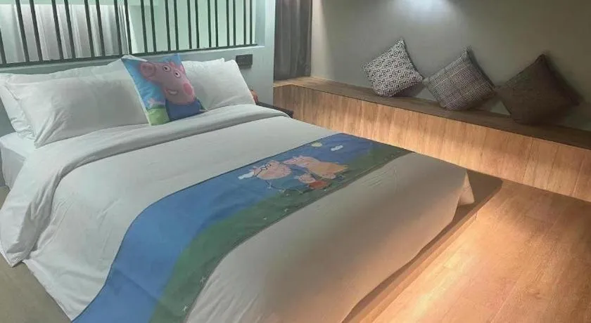 Bed in Opus Hotel Jiangmen
