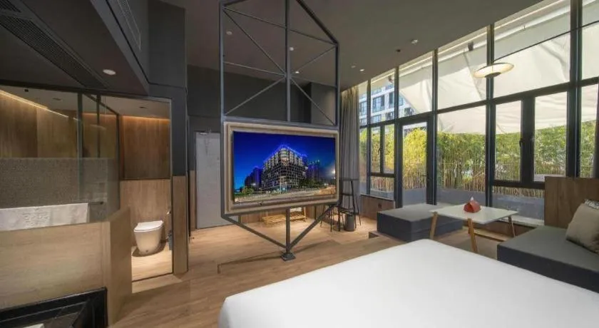 Bed in Opus Hotel Jiangmen