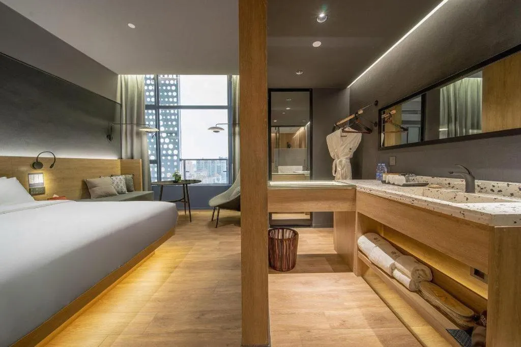 Bed in Opus Hotel Jiangmen