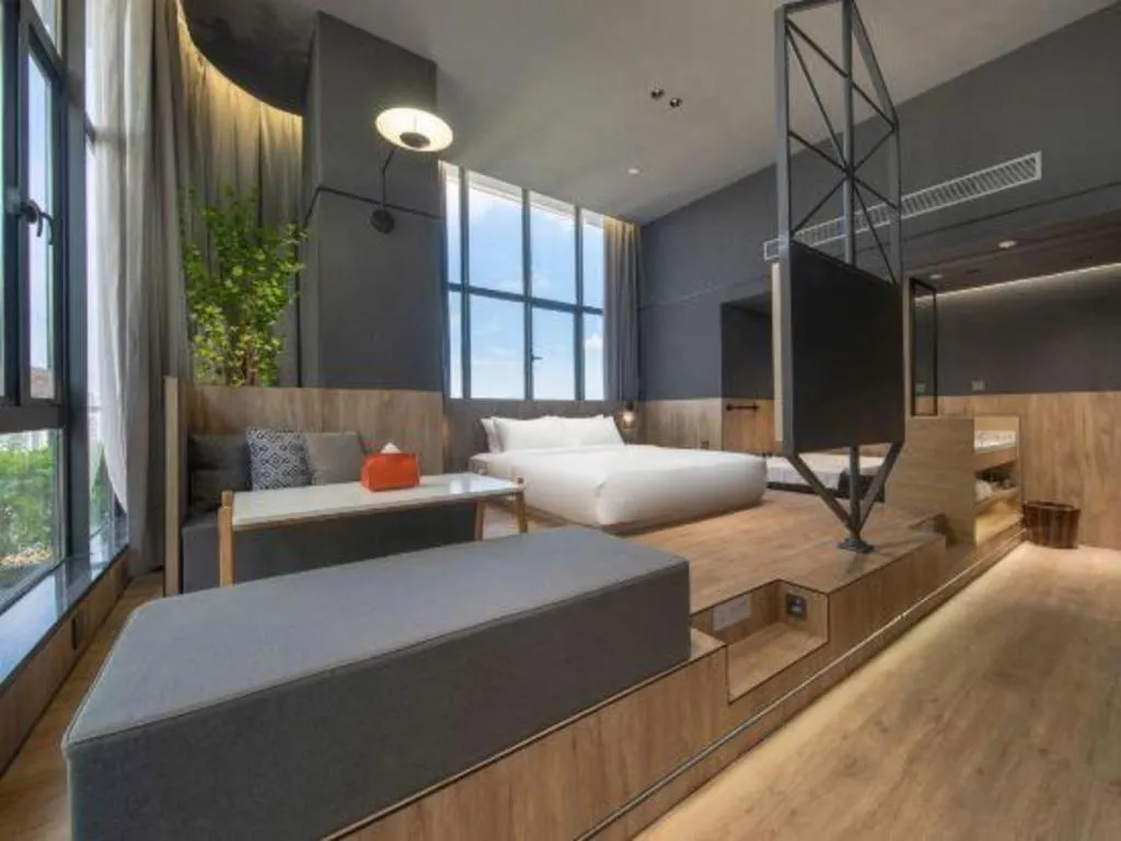 Bed in Opus Hotel Jiangmen