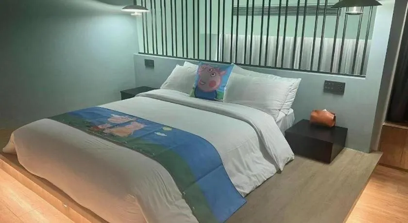 Bed in Opus Hotel Jiangmen