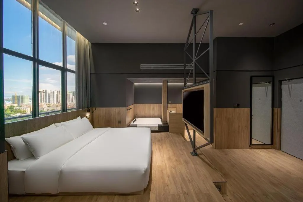 Bed in Opus Hotel Jiangmen