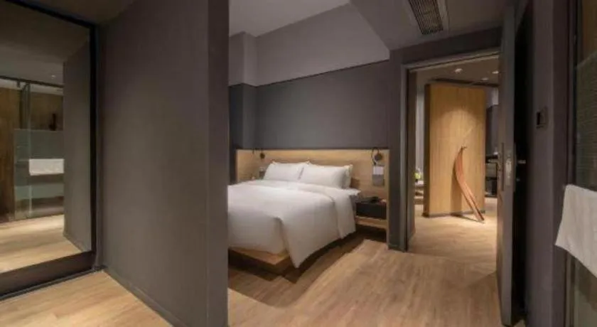 Bed in Opus Hotel Jiangmen