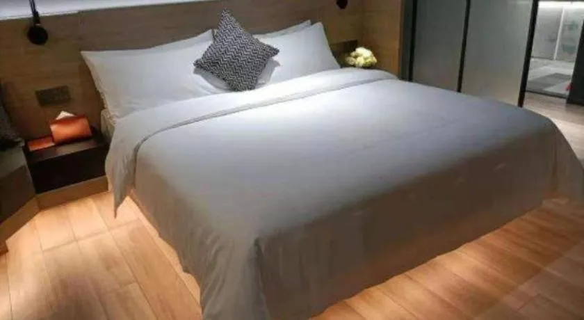 Bed in Opus Hotel Jiangmen