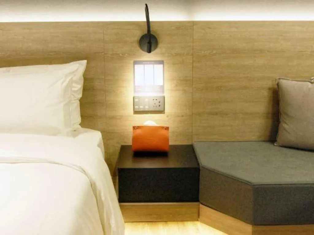 Bed in Opus Hotel Jiangmen